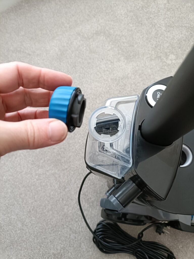 Lid removed from the cleaning solution tank