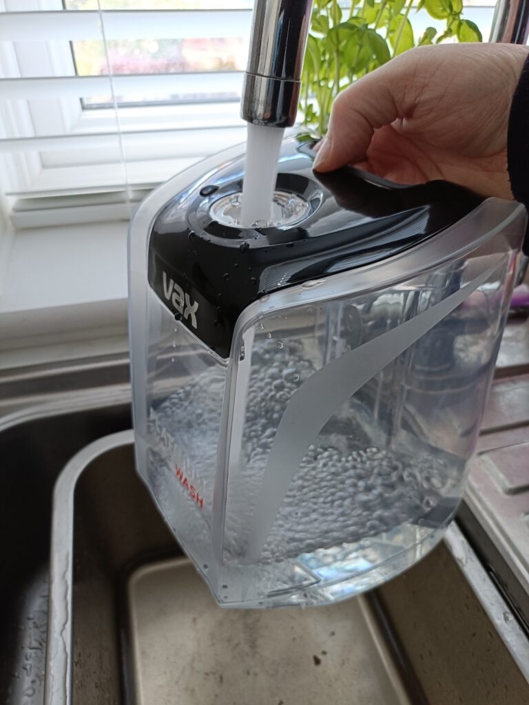 Filling the carpet cleaner water tank