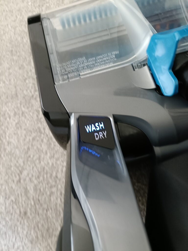 Close-up of the Wash indicator coloured blue