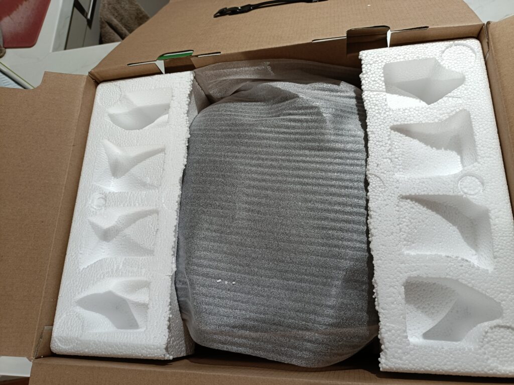 Polystyrene packaging used to retain the rice cooker