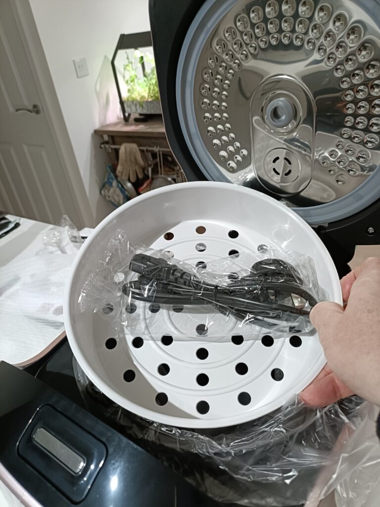 Steaming basket and power cord